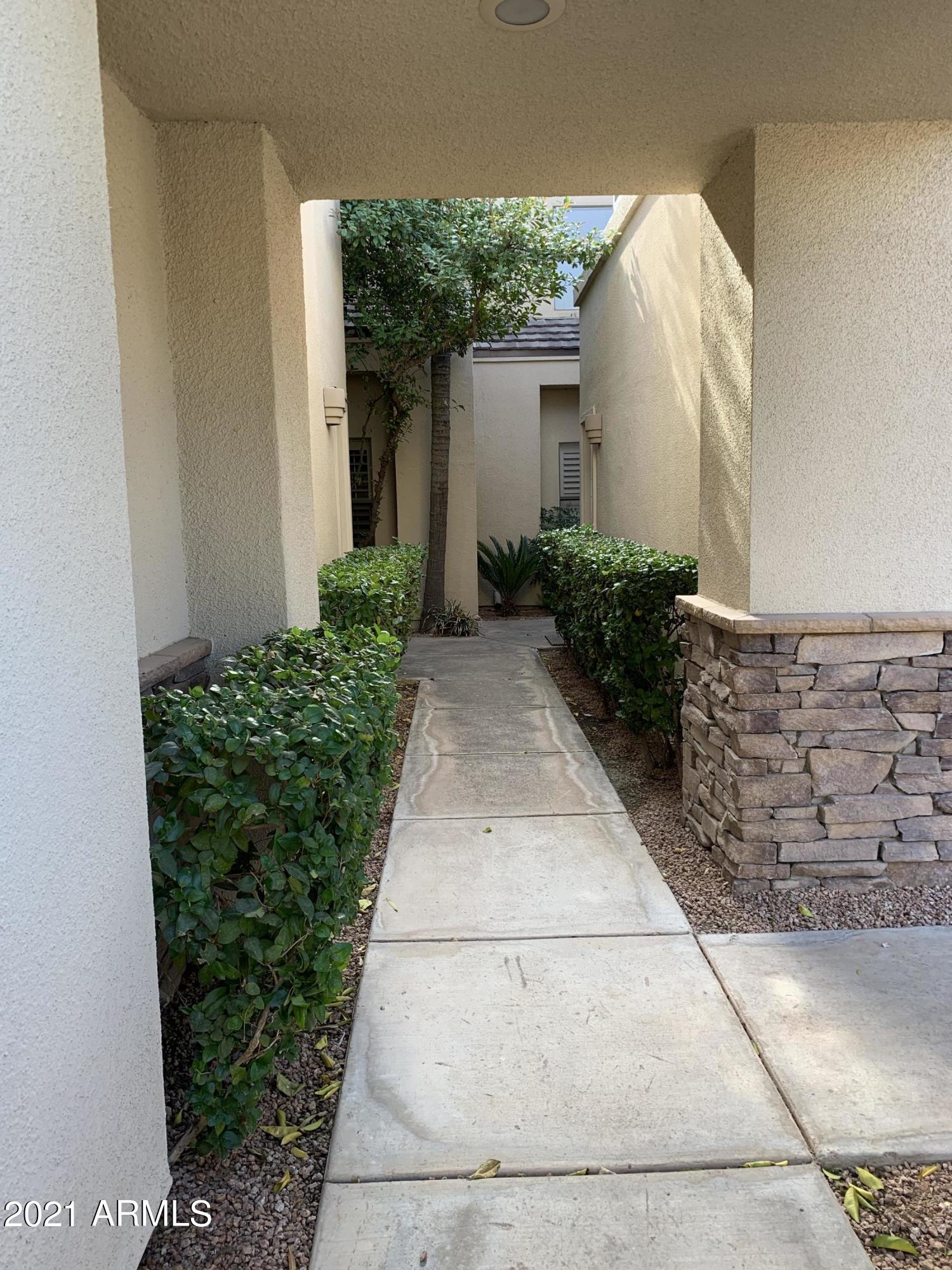 7272 East Gainey Ranch Road, Unit 114 Scottsdale, AZ 85258 - Photo 4 of 70 WALK WAY UP TO FRONT DOOR