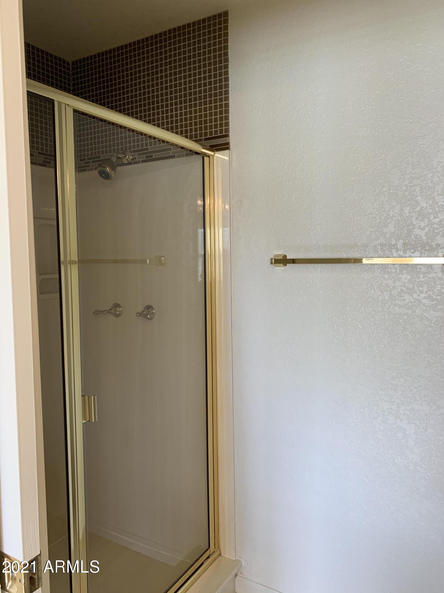 7272 East Gainey Ranch Road, Unit 114 Scottsdale, AZ 85258 - Photo 43 of 70 WALK IN SHOWER IN MASTER BATH