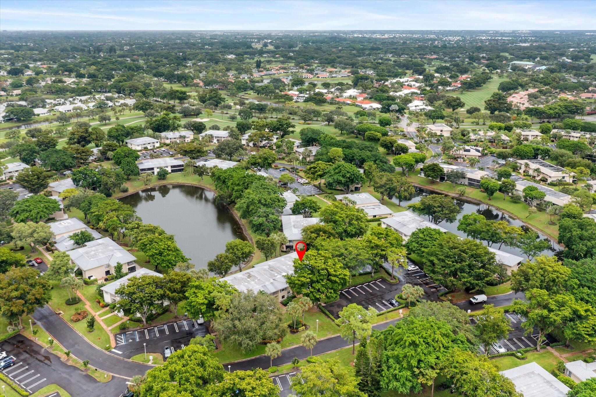 30 Westgate Lane, Unit 30G Boynton Beach, FL 33436 - Photo 37 of 58 an aerial view of residential house with outdoor space and trees all around