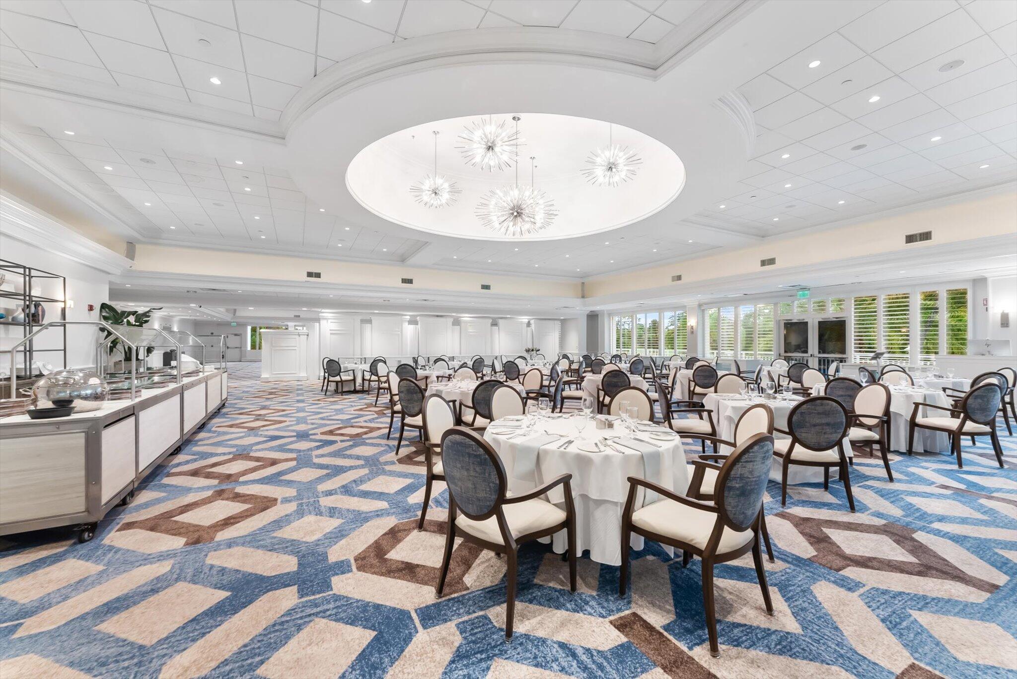 30 Westgate Lane, Unit 30G Boynton Beach, FL 33436 - Photo 48 of 58 a very nice looking living room with a dining table a rug and kitchen view