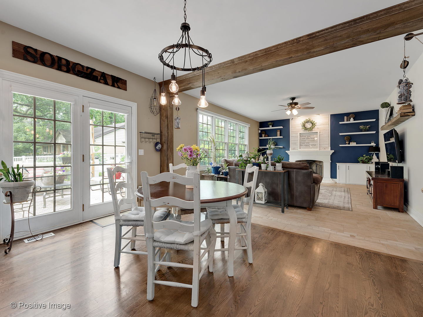 27W617 Garys Mill Road Winfield, IL 60190 - Photo 12 of 35 a view of a dining room with furniture window and wooden floor