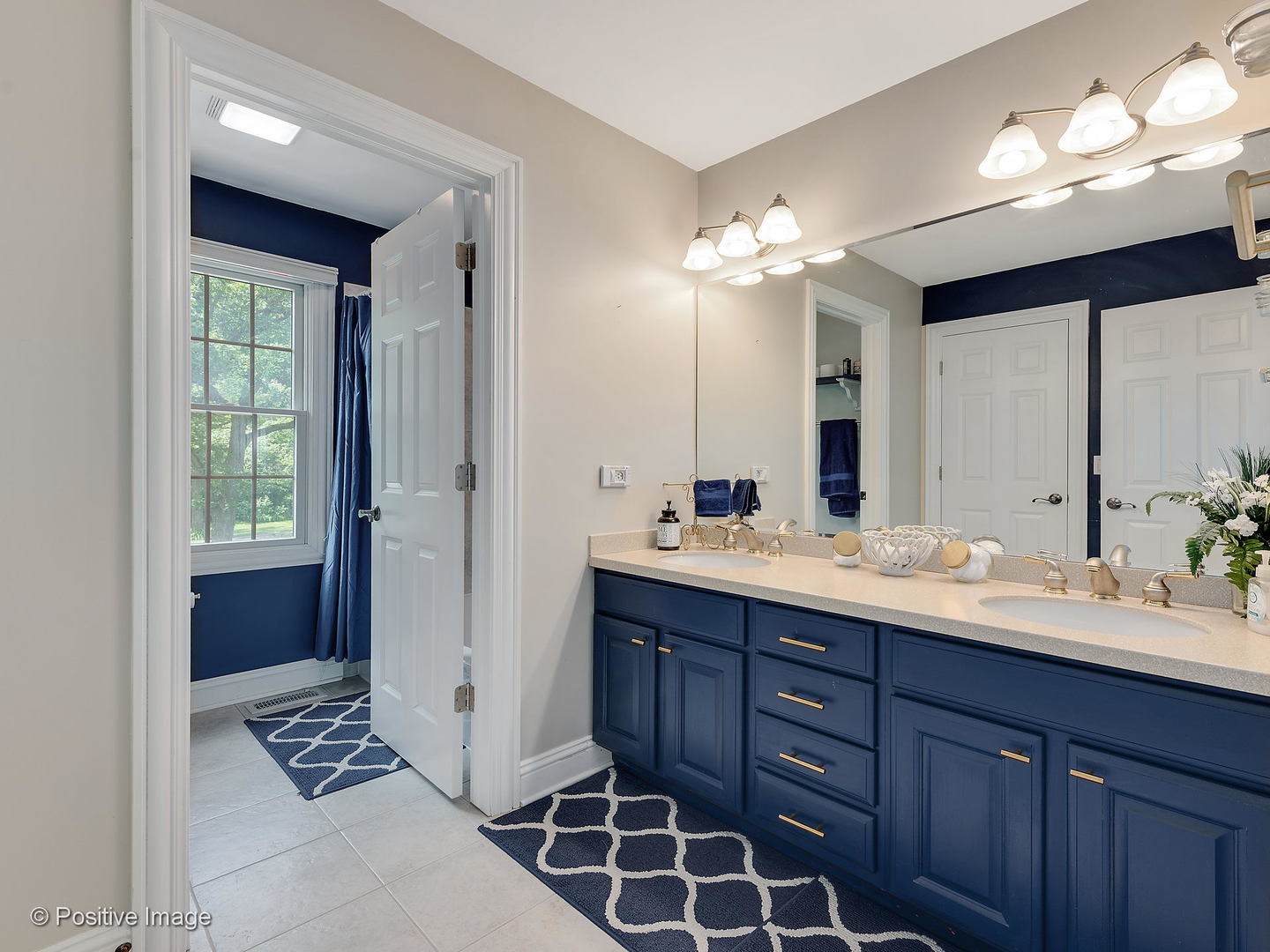 27W617 Garys Mill Road Winfield, IL 60190 - Photo 20 of 35 a bathroom with a double vanity sink mirror and