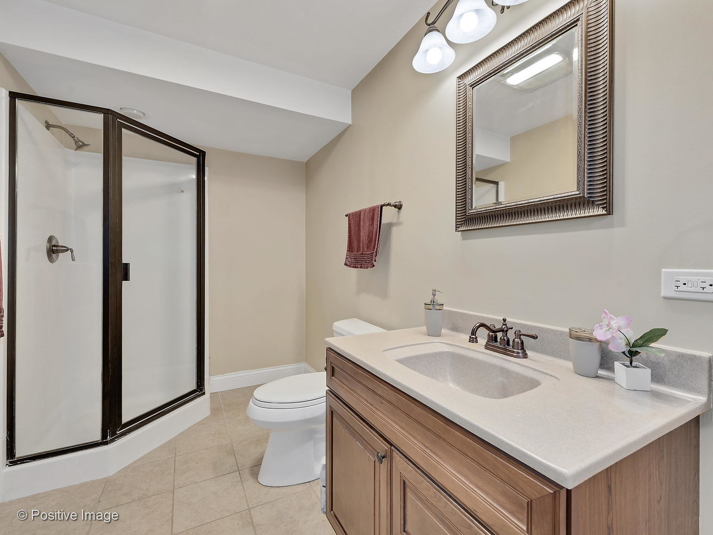 27W617 Garys Mill Road Winfield, IL 60190 - Photo 28 of 35 a bathroom with a sink toilet and mirror