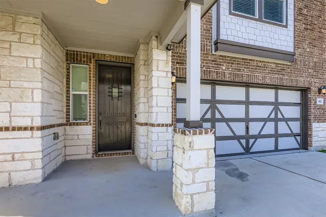 front view of a house with an outdoor space