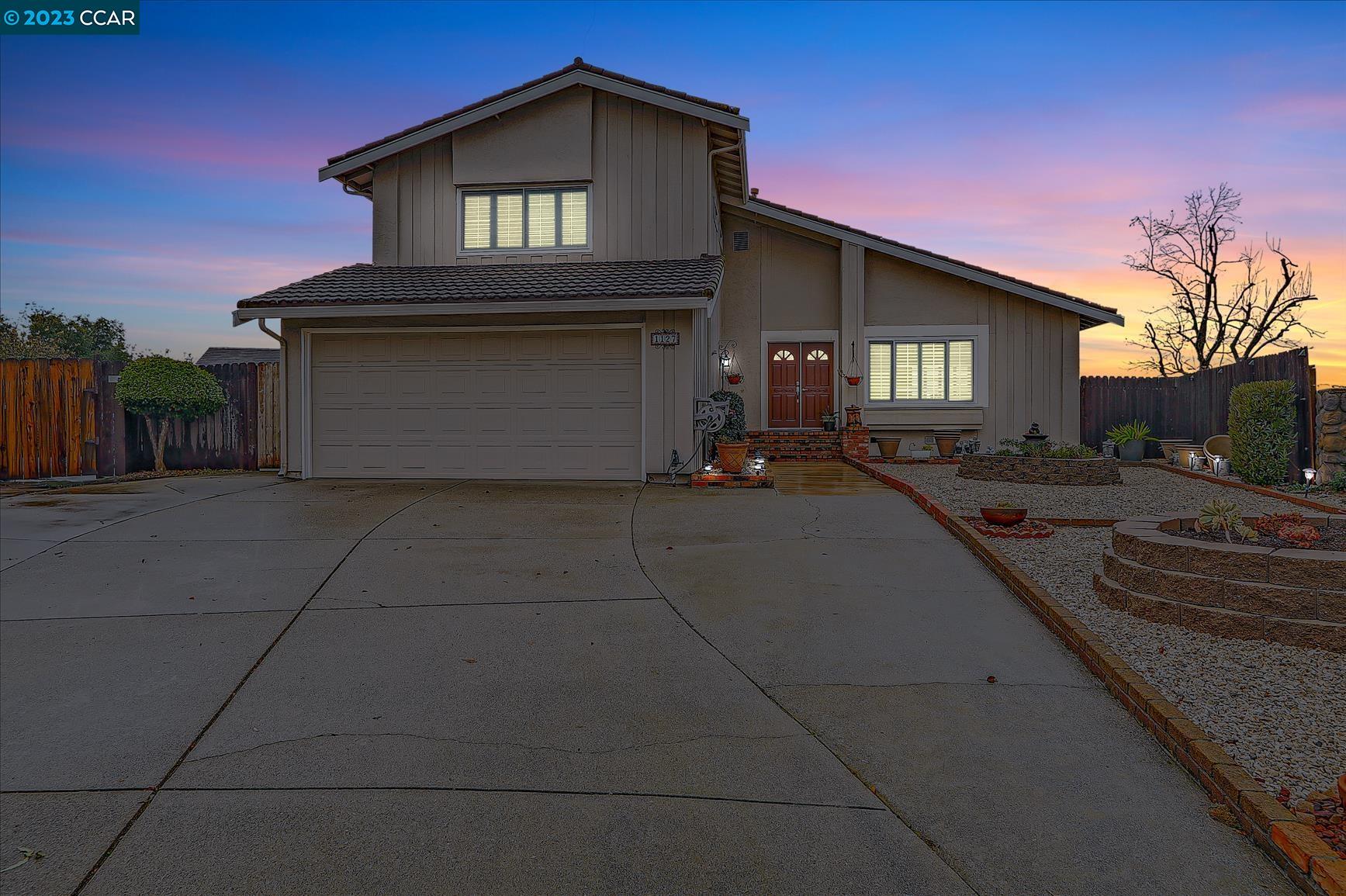 a house view with a outdoor space