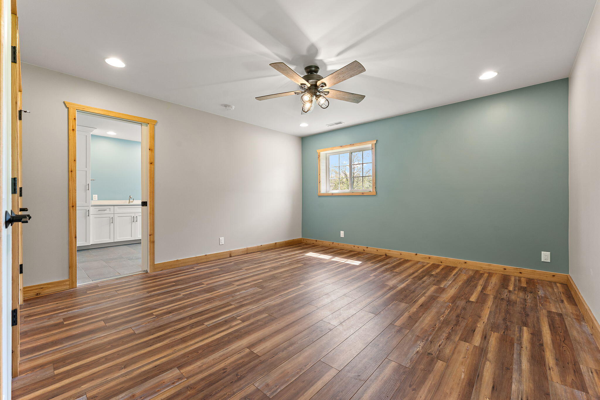 6631 Beach Street Knox, IN 46534 - Photo 14 of 41 wooden floor in an empty room with a window