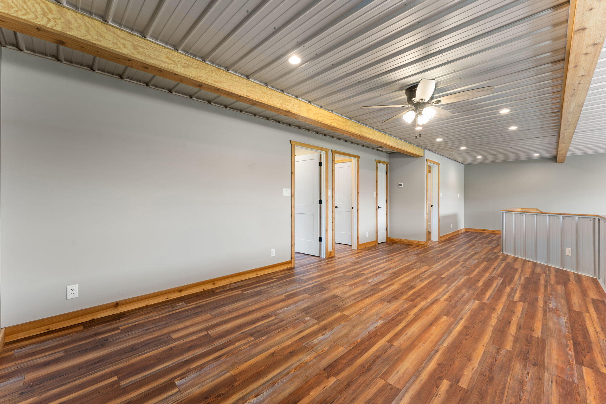 6631 Beach Street Knox, IN 46534 - Photo 21 of 41 a view of an empty room with wooden floor