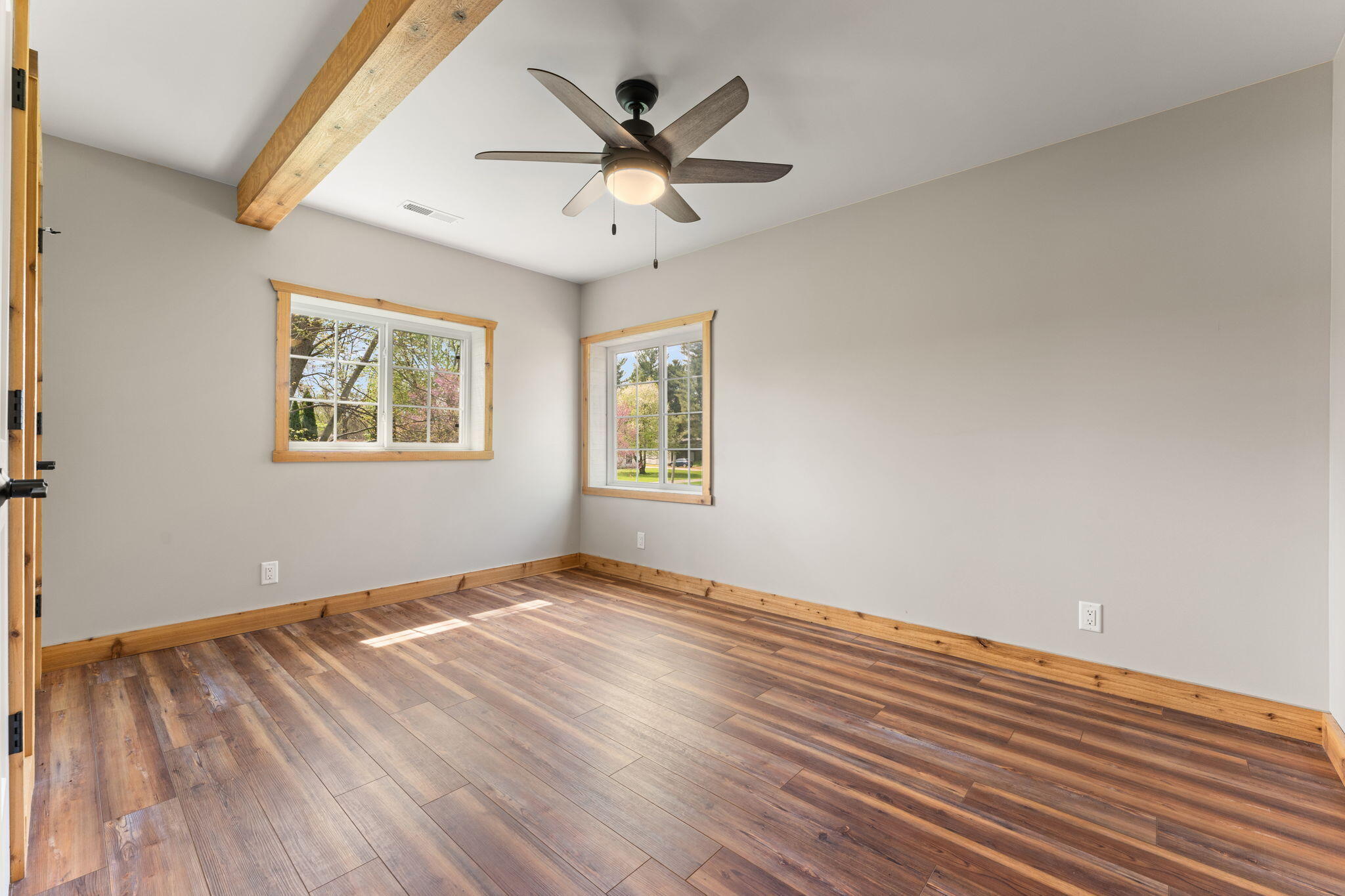 6631 Beach Street Knox, IN 46534 - Photo 23 of 41 wooden floor in an empty room with a window