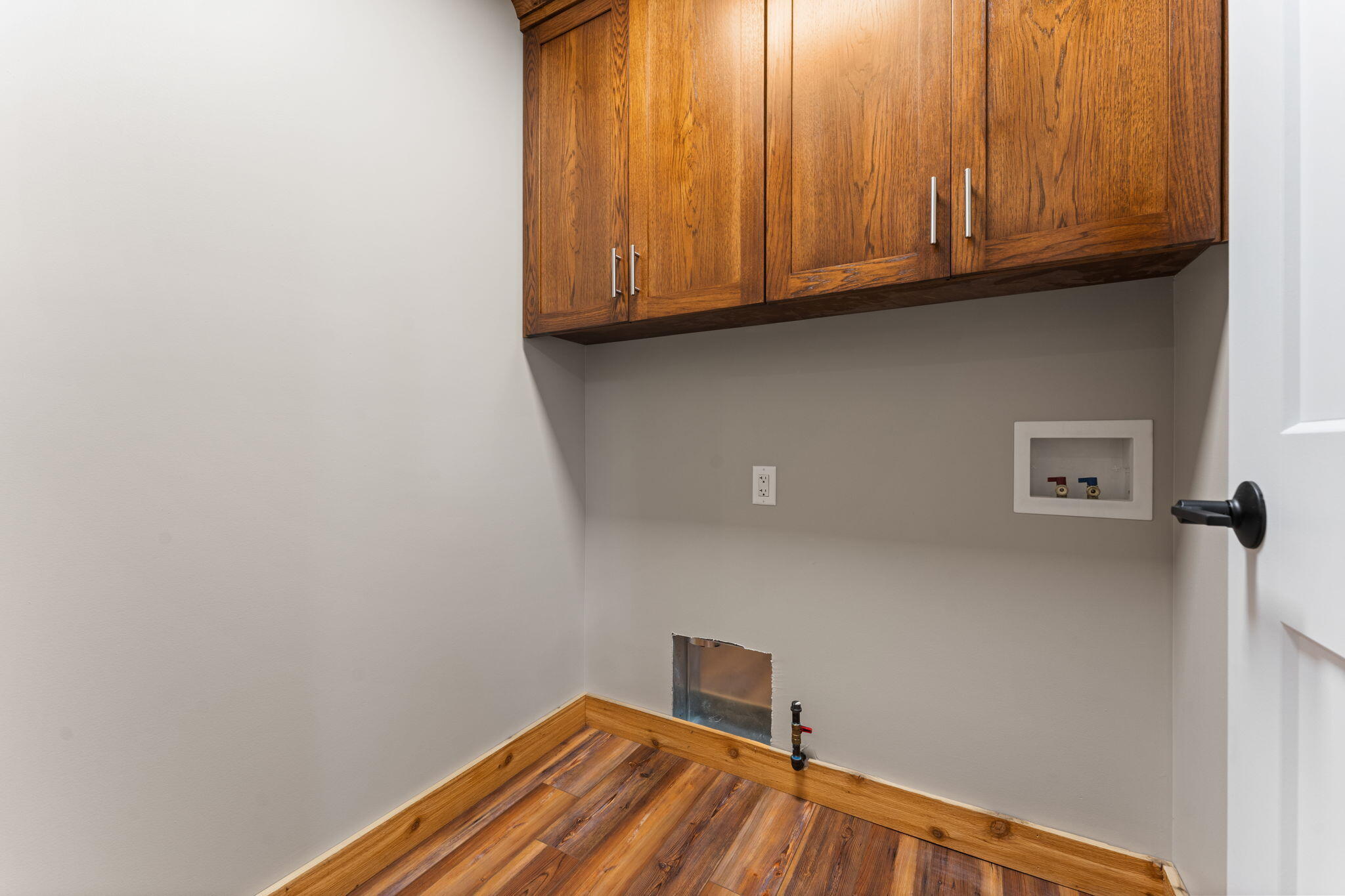 6631 Beach Street Knox, IN 46534 - Photo 25 of 41 a view of a room with wooden floor and cabinet