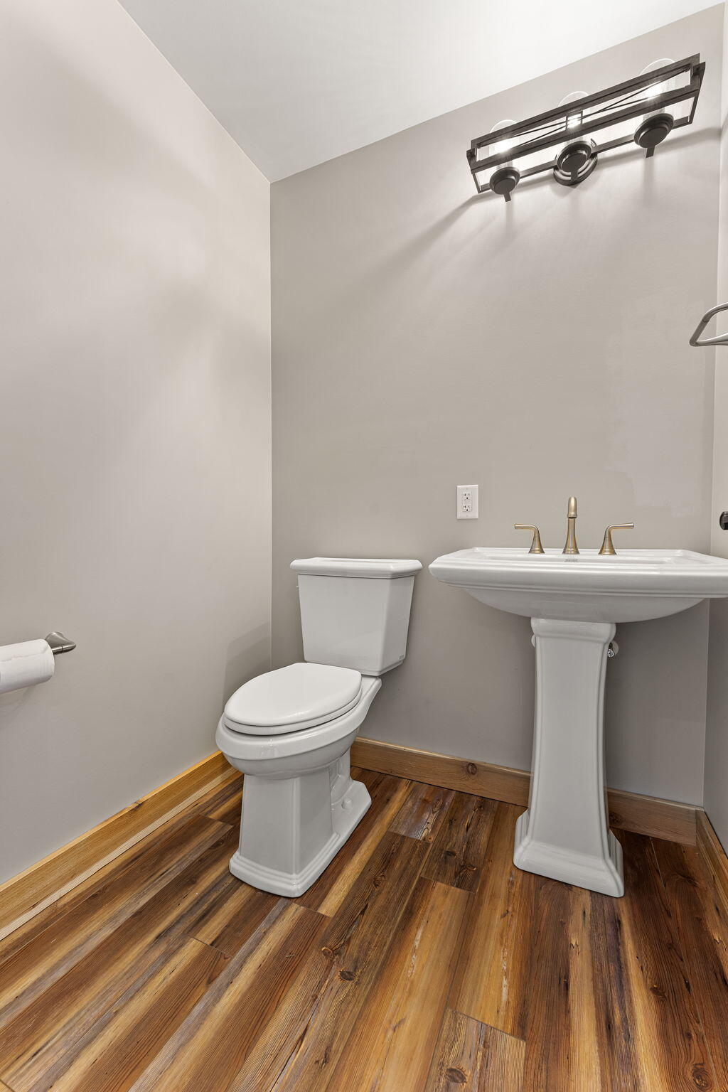 6631 Beach Street Knox, IN 46534 - Photo 26 of 41 a bathroom with a sink and a toilet