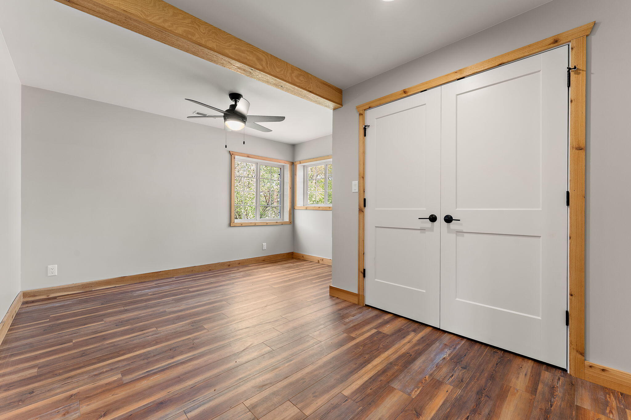 6631 Beach Street Knox, IN 46534 - Photo 29 of 41 a view of an empty room with a window and wooden floor