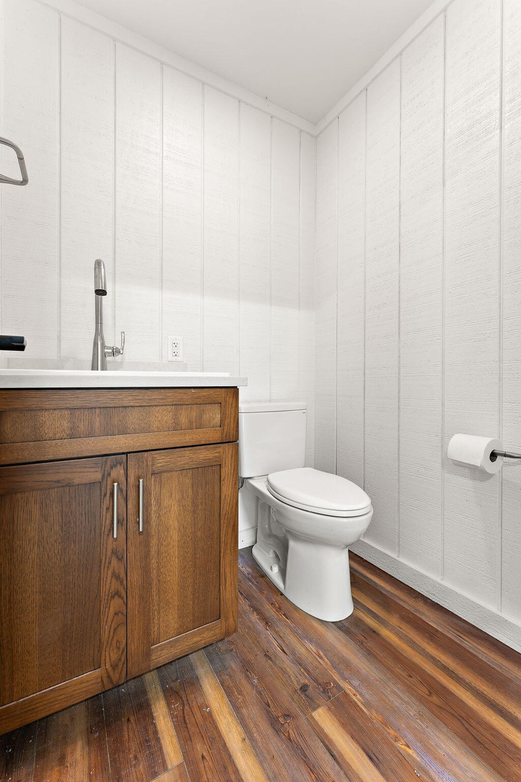 6631 Beach Street Knox, IN 46534 - Photo 32 of 41 a bathroom with a toilet a sink and mirror