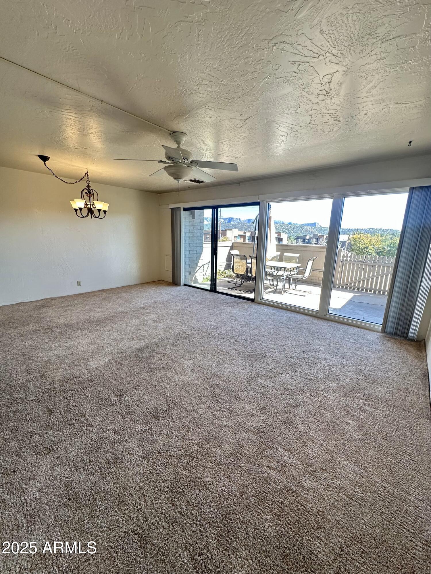 3340 West State Rte 89A, Unit 9 Sedona, AZ 86336 - Photo 3 of 34 Main Living area with floor to ceiling w
