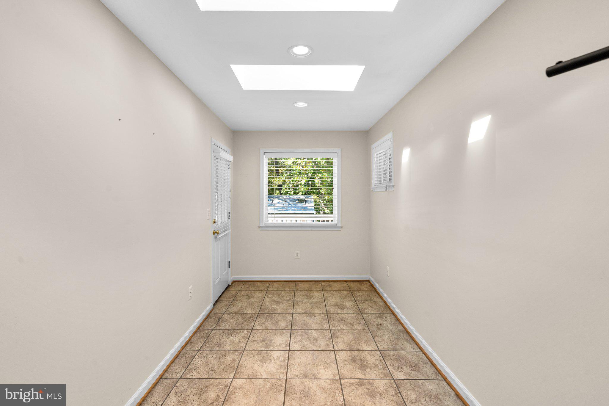 12840 Littleton Street Silver Spring, MD 20906 - Photo 12 of 33 Breakfast room off Kitchen with Skylights