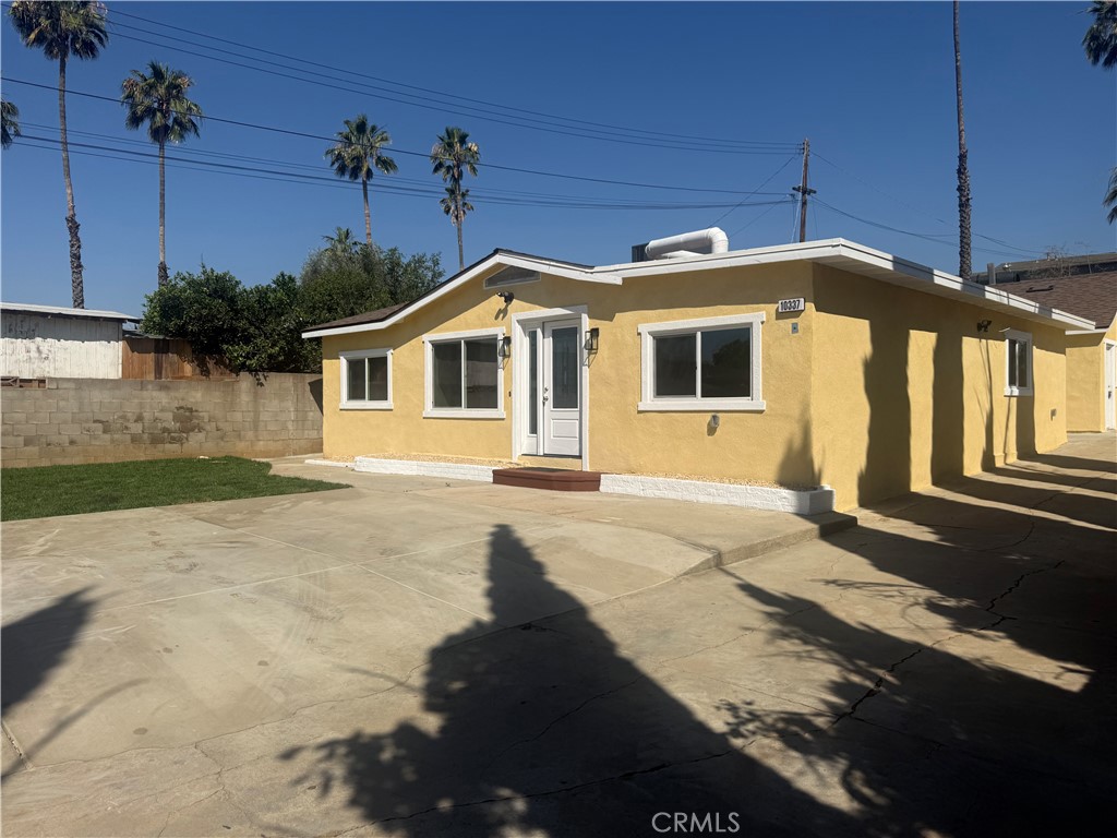 10337 Mull Avenue Riverside, CA 92505 - Photo 2 of 28 a front view of a house with a yard