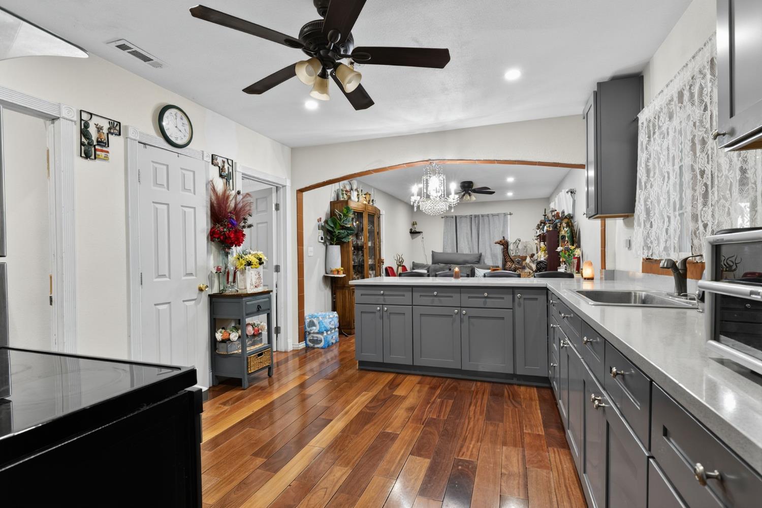 5263 Chile Camp Road Campo Seco X, CA 95226 - Photo 4 of 24 a kitchen with cabinets and wooden floor