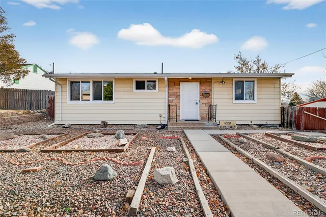 a view of bathroom with a sink mirror and shower