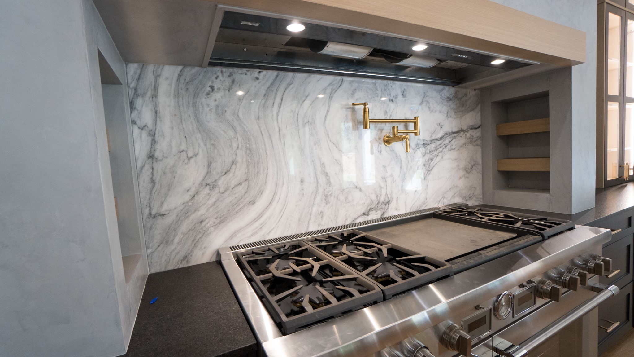 1731 Benbow Way Houston, TX 77080 - Photo 14 of 15 a black and white stove sitting inside of a kitchen