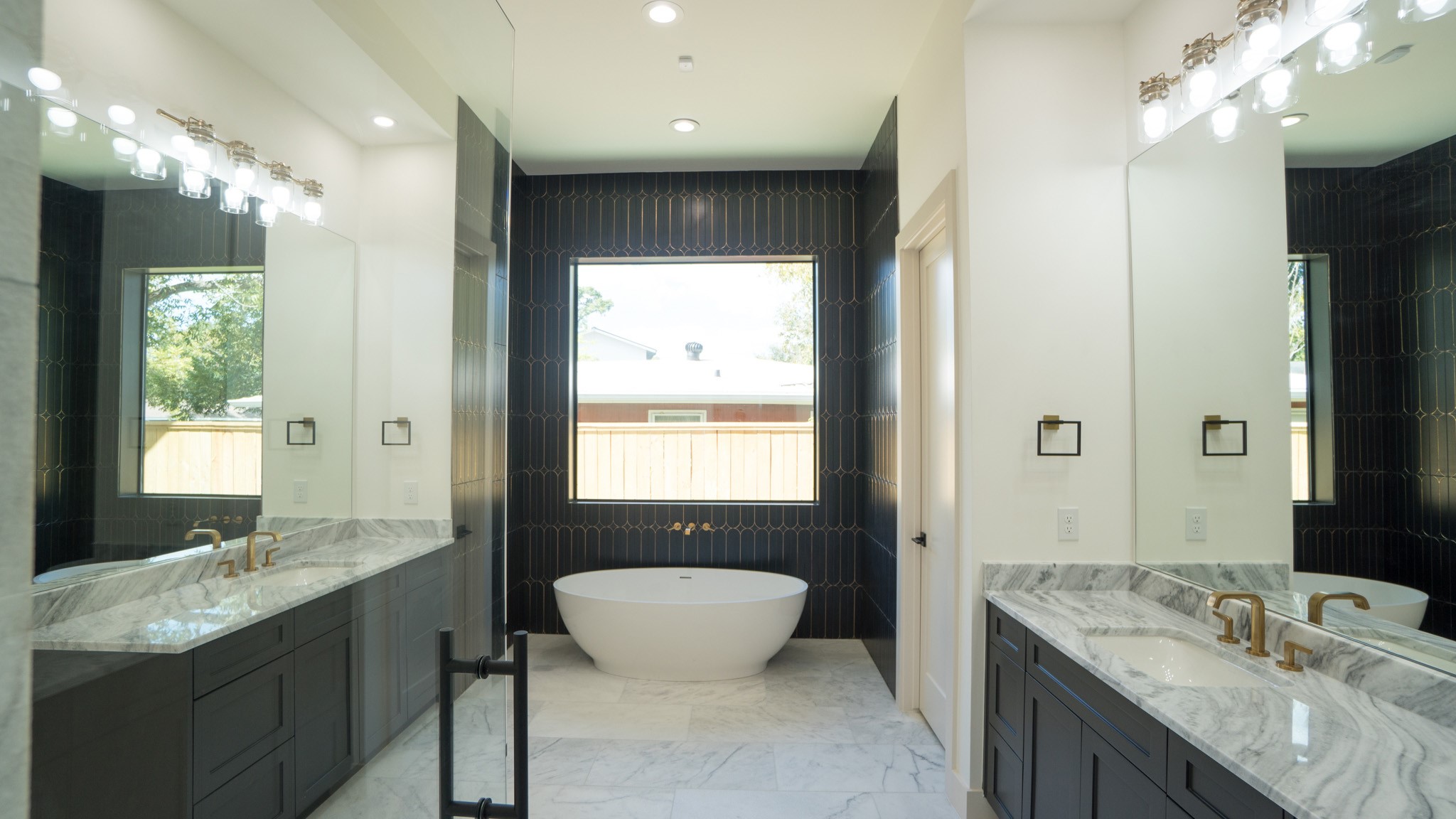 1731 Benbow Way Houston, TX 77080 - Photo 9 of 15 a bathroom with a granite countertop sink a toilet and mirror