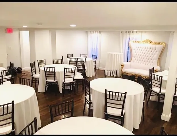 a view of a dining room with furniture