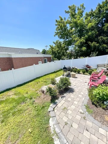 a view of swimming pool with a yard