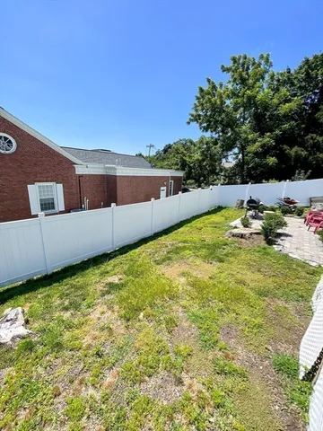 a view of a lake with a big yard