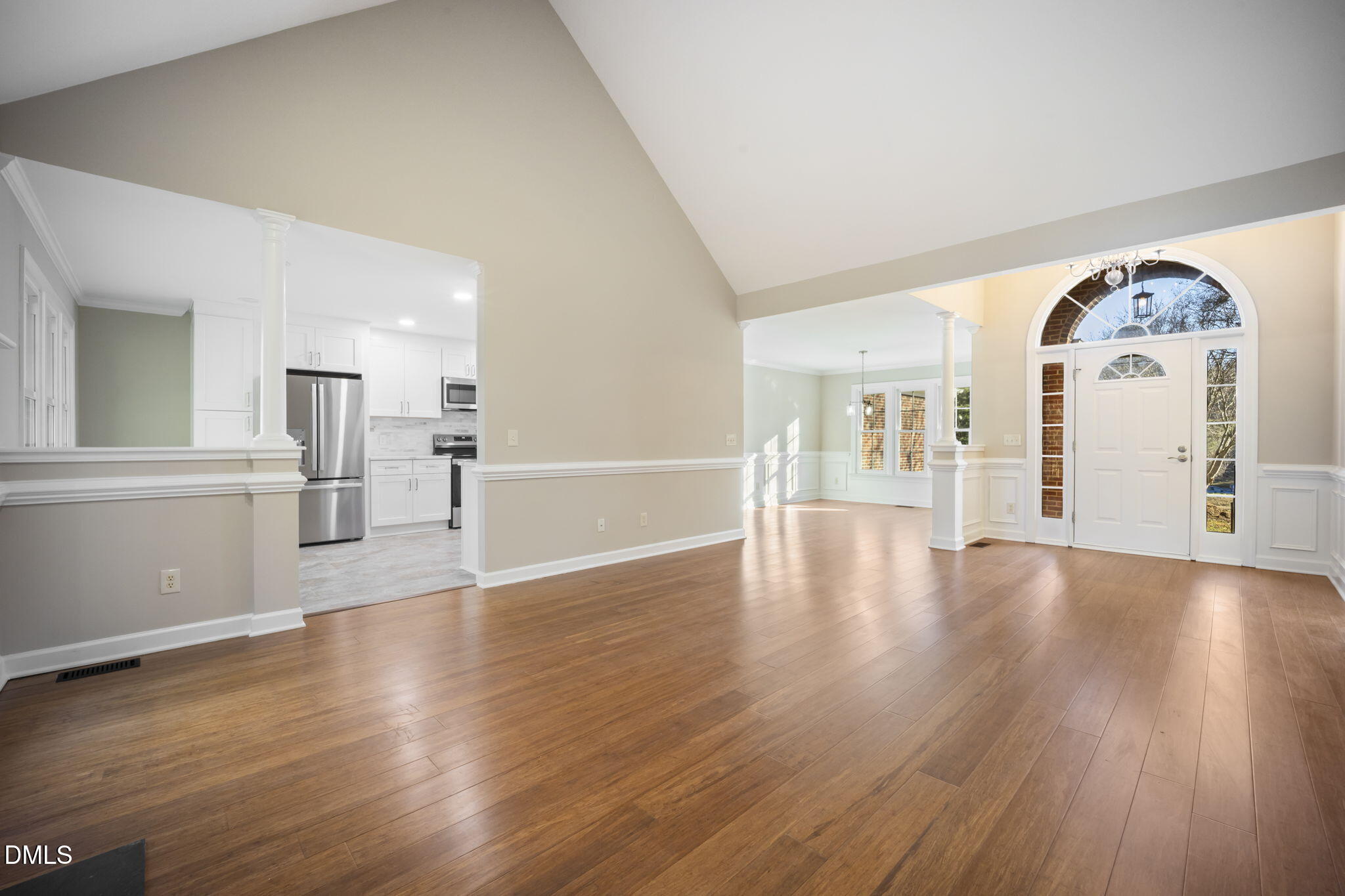 912 Broadhaven Drive Raleigh, NC 27603 - Photo 13 of 53 a view of a livingroom with wooden floor