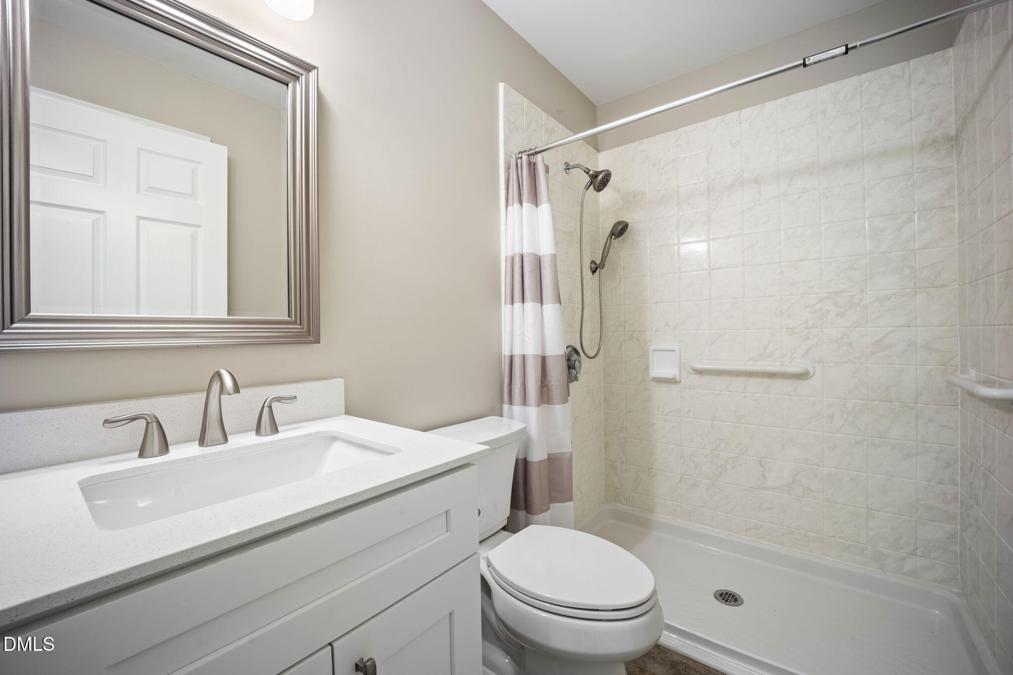 912 Broadhaven Drive Raleigh, NC 27603 - Photo 20 of 53 a bathroom with a sink toilet and shower