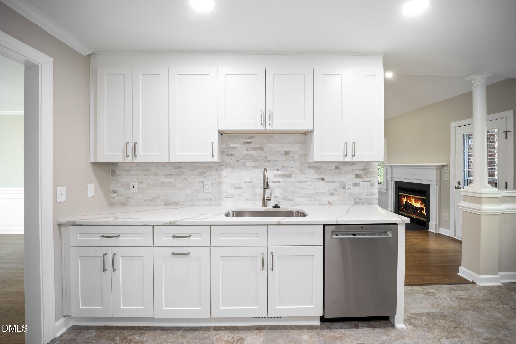 912 Broadhaven Drive Raleigh, NC 27603 - Photo 26 of 53 a kitchen with white cabinets and sink