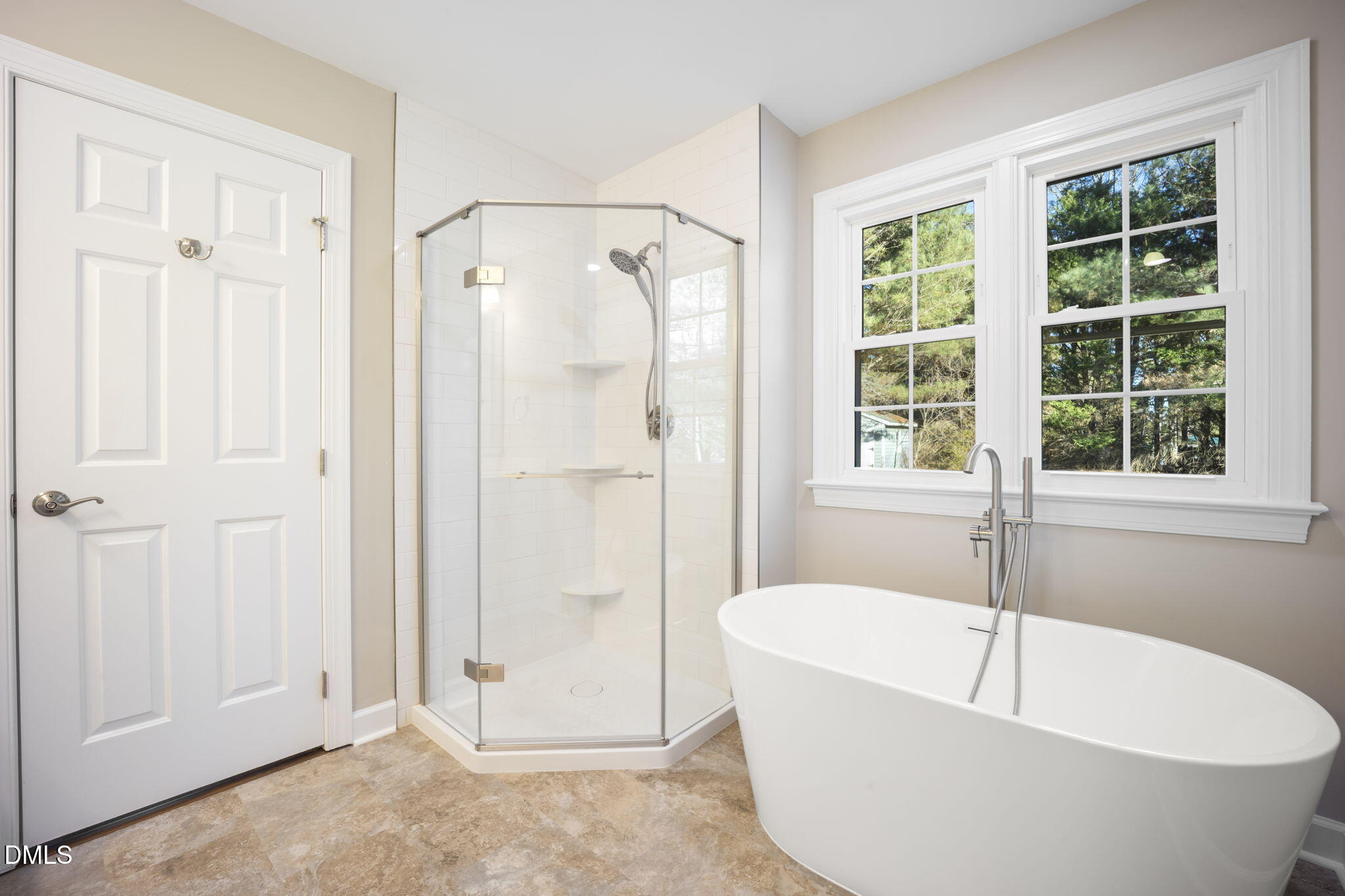 912 Broadhaven Drive Raleigh, NC 27603 - Photo 29 of 51 a white bath tub sitting next to a window