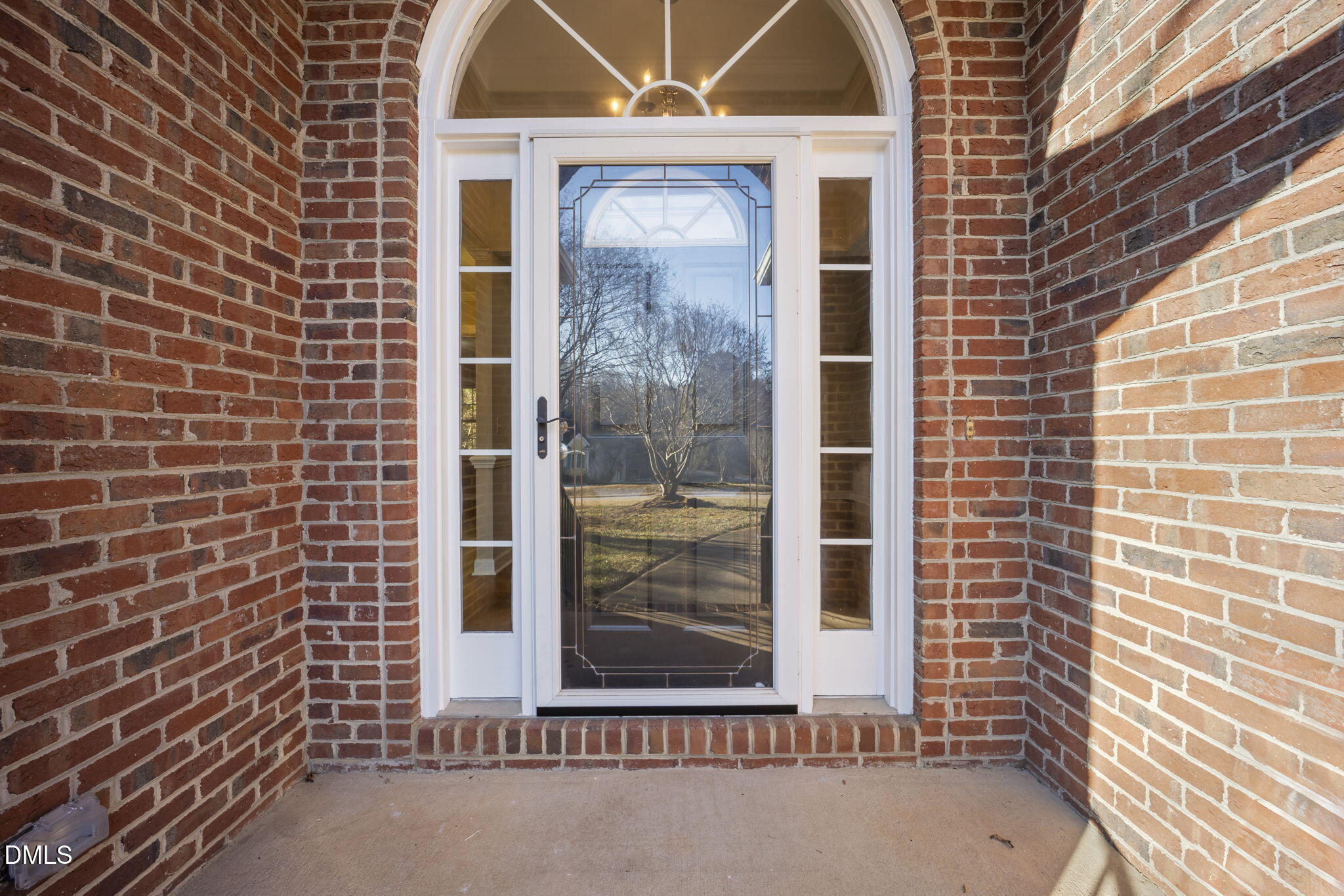 912 Broadhaven Drive Raleigh, NC 27603 - Photo 47 of 53 a view of a brick house with front door
