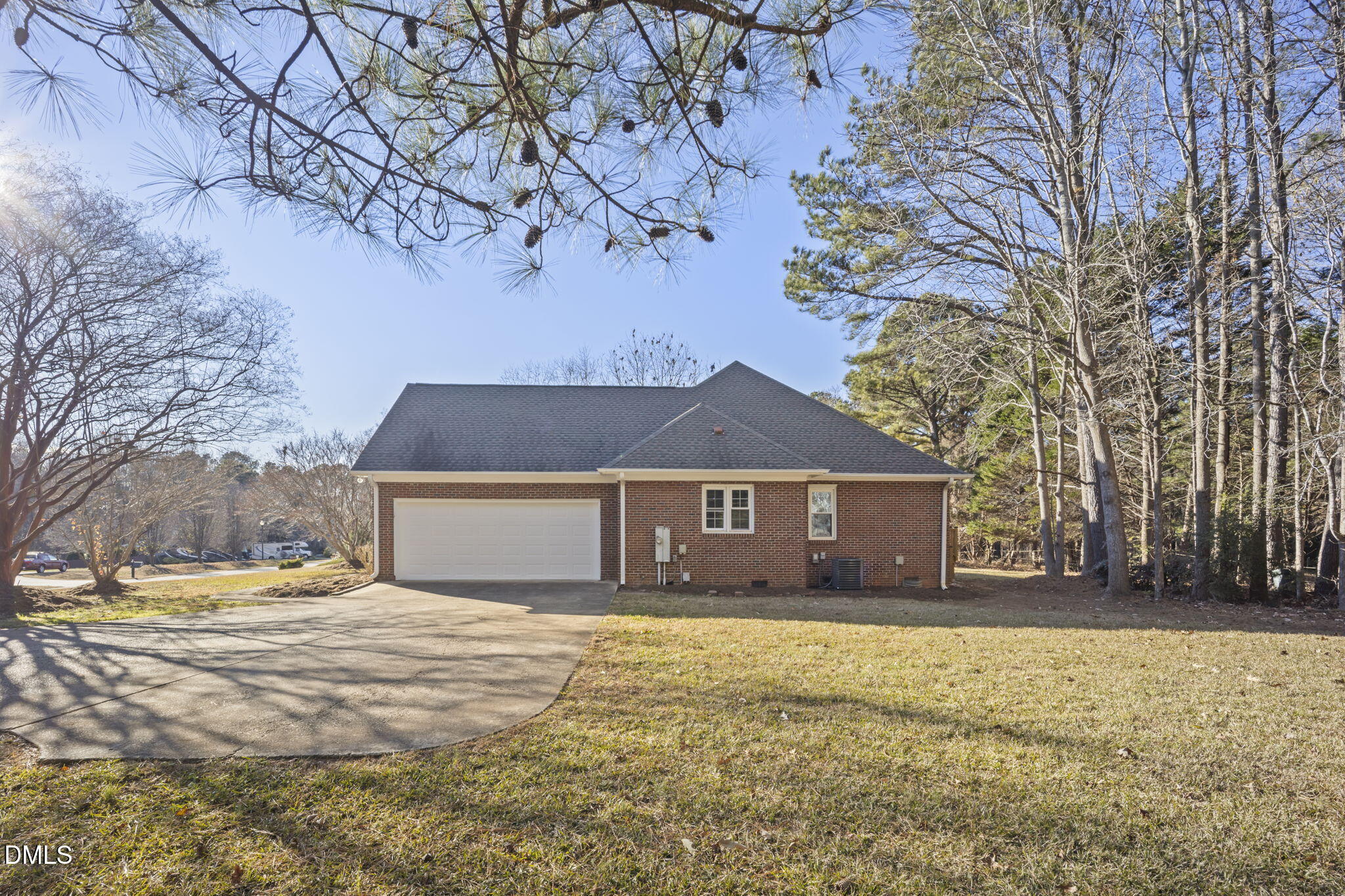 912 Broadhaven Drive Raleigh, NC 27603 - Photo 5 of 53 a front view of a house with a yard