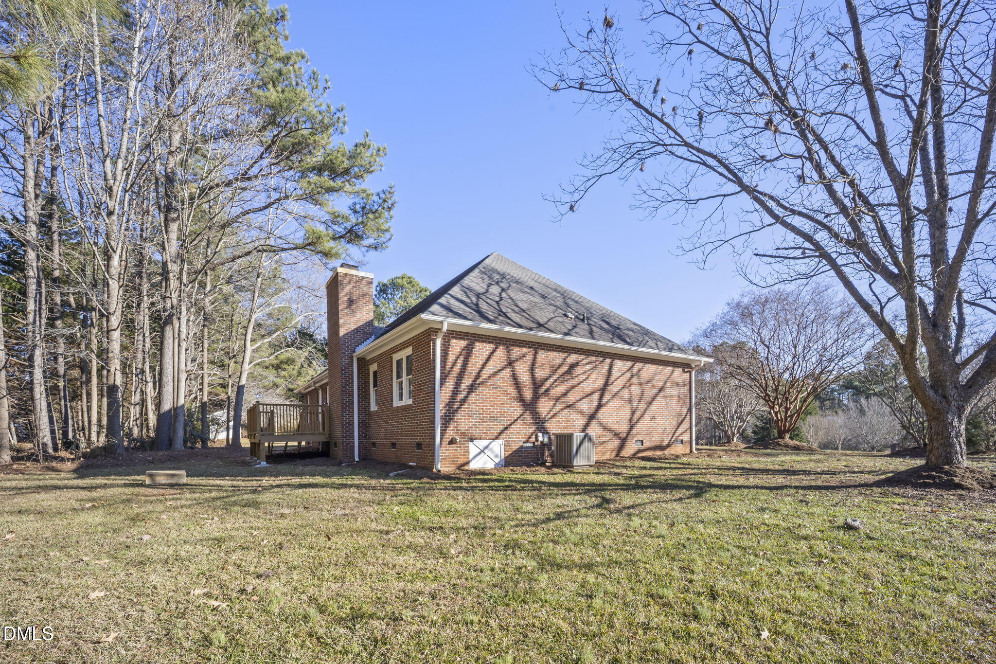 912 Broadhaven Drive Raleigh, NC 27603 - Photo 7 of 53 a view of a house with a yard covered with snow