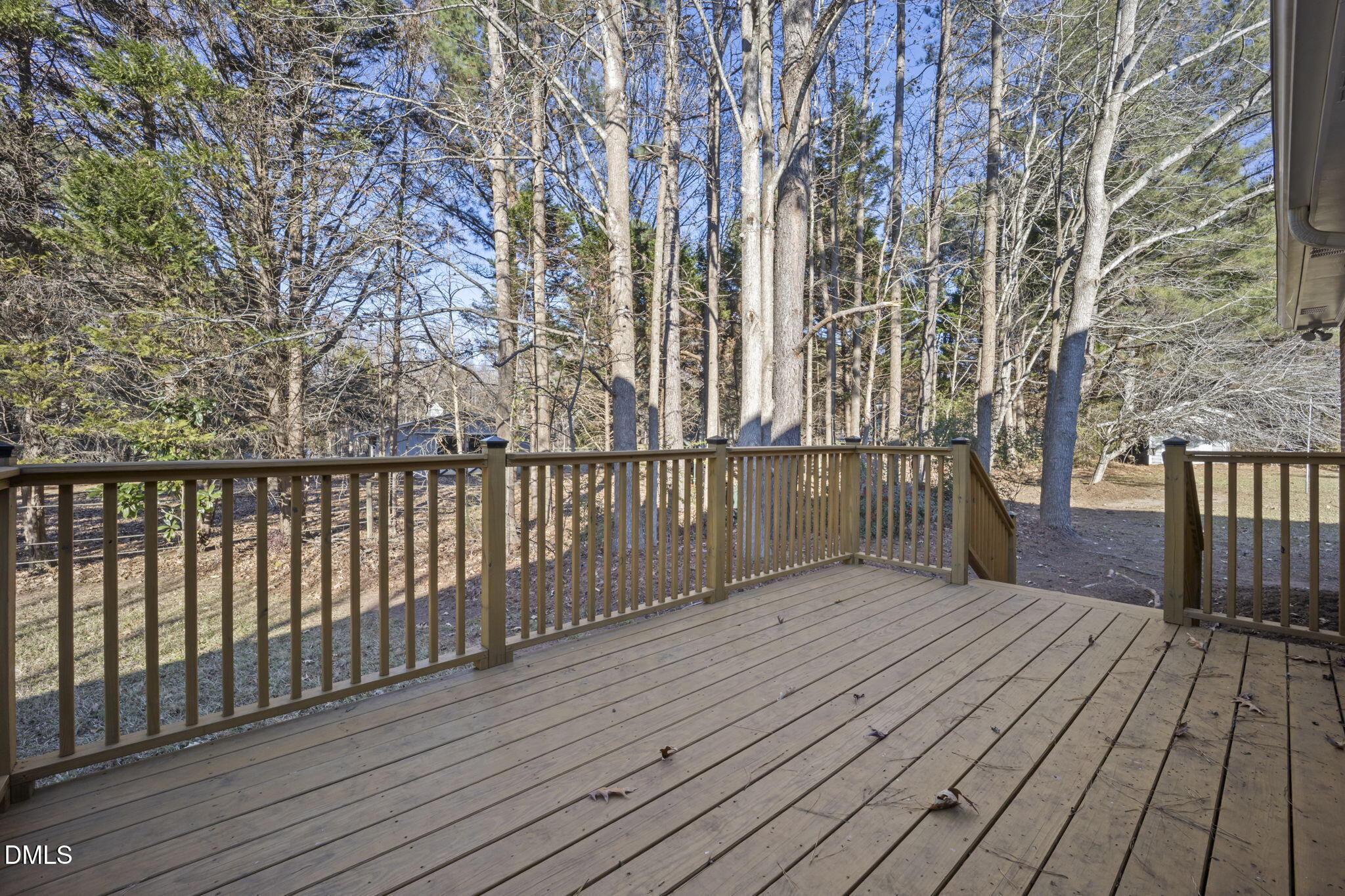 912 Broadhaven Drive Raleigh, NC 27603 - Photo 9 of 53 a view of backyard with a deck