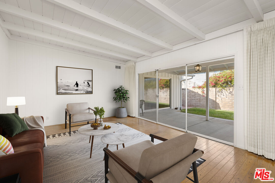 12146 Travis Street Los Angeles, CA 90049 - Photo 5 of 12 a living room with furniture