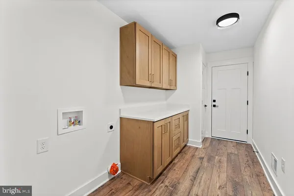 a hallway with cabinets