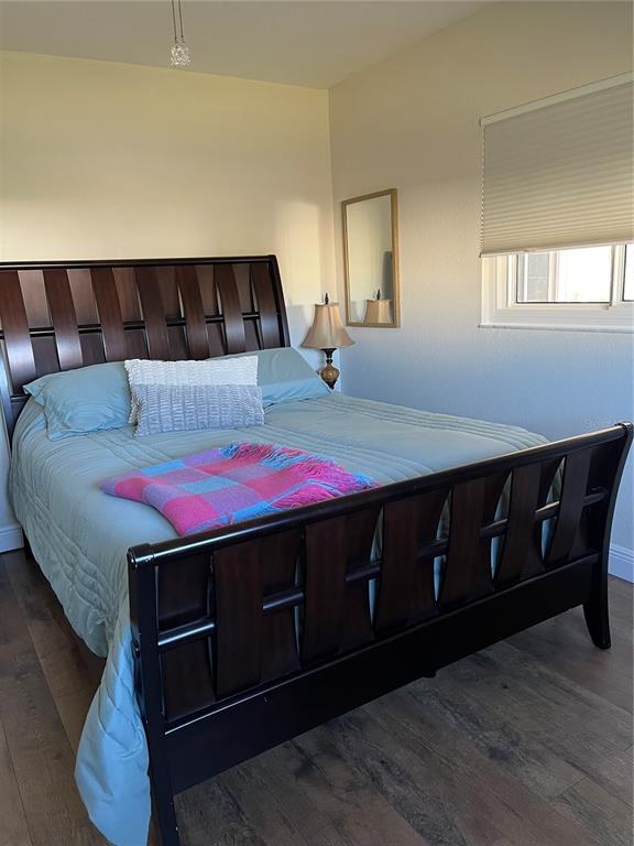 13834 Southwest 114th Avenue Dunnellon, FL 34432 - Photo 17 of 22 a living room with a bed and dresser