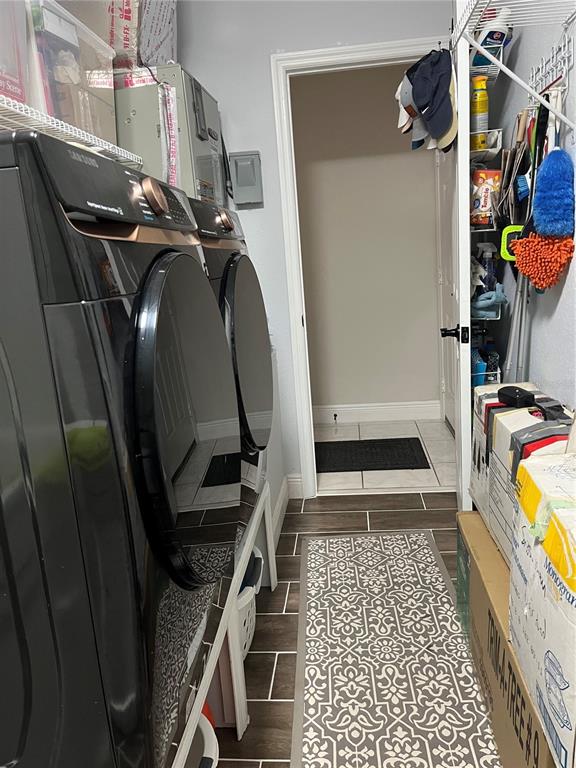 13834 Southwest 114th Avenue Dunnellon, FL 34432 - Photo 19 of 22 a view of walk in closet with clothes and shoes