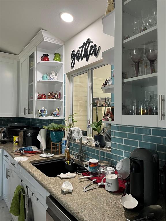13834 Southwest 114th Avenue Dunnellon, FL 34432 - Photo 3 of 22 a kitchen with sink and cabinets
