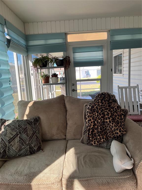 13834 Southwest 114th Avenue Dunnellon, FL 34432 - Photo 10 of 22 a living room with furniture and a large window