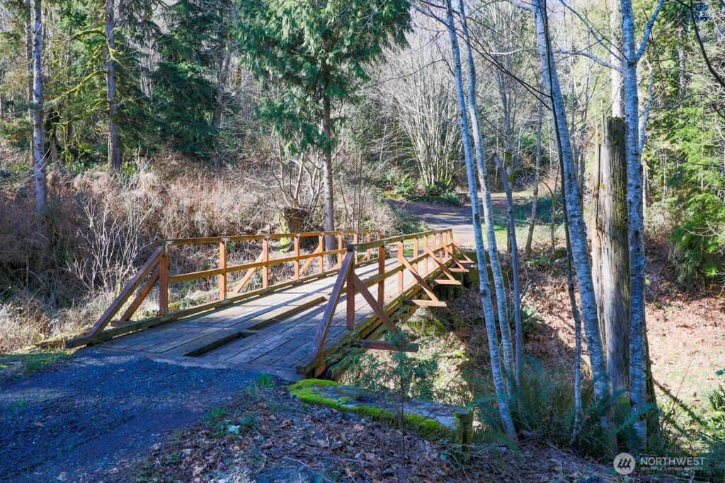26663 Big Valley Road Northeast Poulsbo, WA 98370 - Photo 20 of 40 a view of a yard