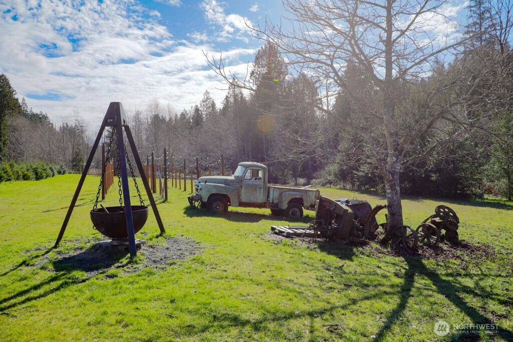 26663 Big Valley Road Northeast Poulsbo, WA 98370 - Photo 6 of 40 a view of a garden with a slide