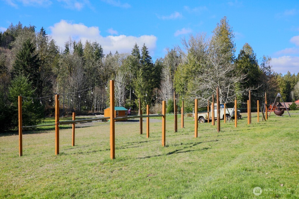 26663 Big Valley Road Northeast Poulsbo, WA 98370 - Photo 8 of 40 a view of a park with swings