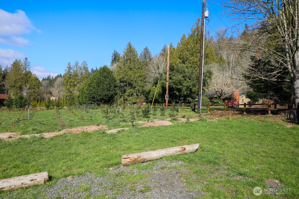 26663 Big Valley Road Northeast Poulsbo, WA 98370 - Photo 10 of 40 a view of outdoor space with deck and yard