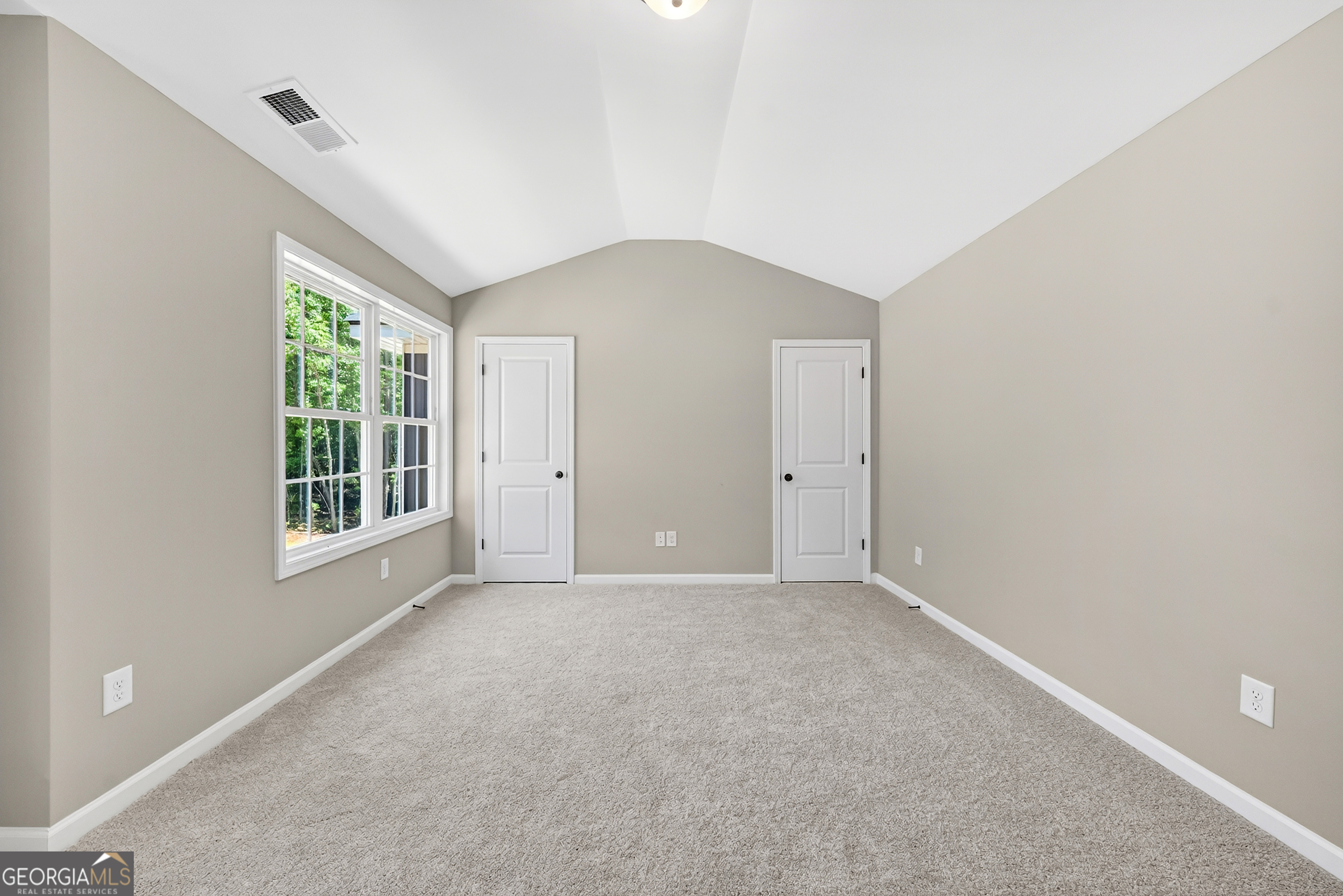 38 Oak Ridge Drive, Unit 26 Waverly Hall, GA 31831 - Photo 30 of 37 a view of an empty room with a window
