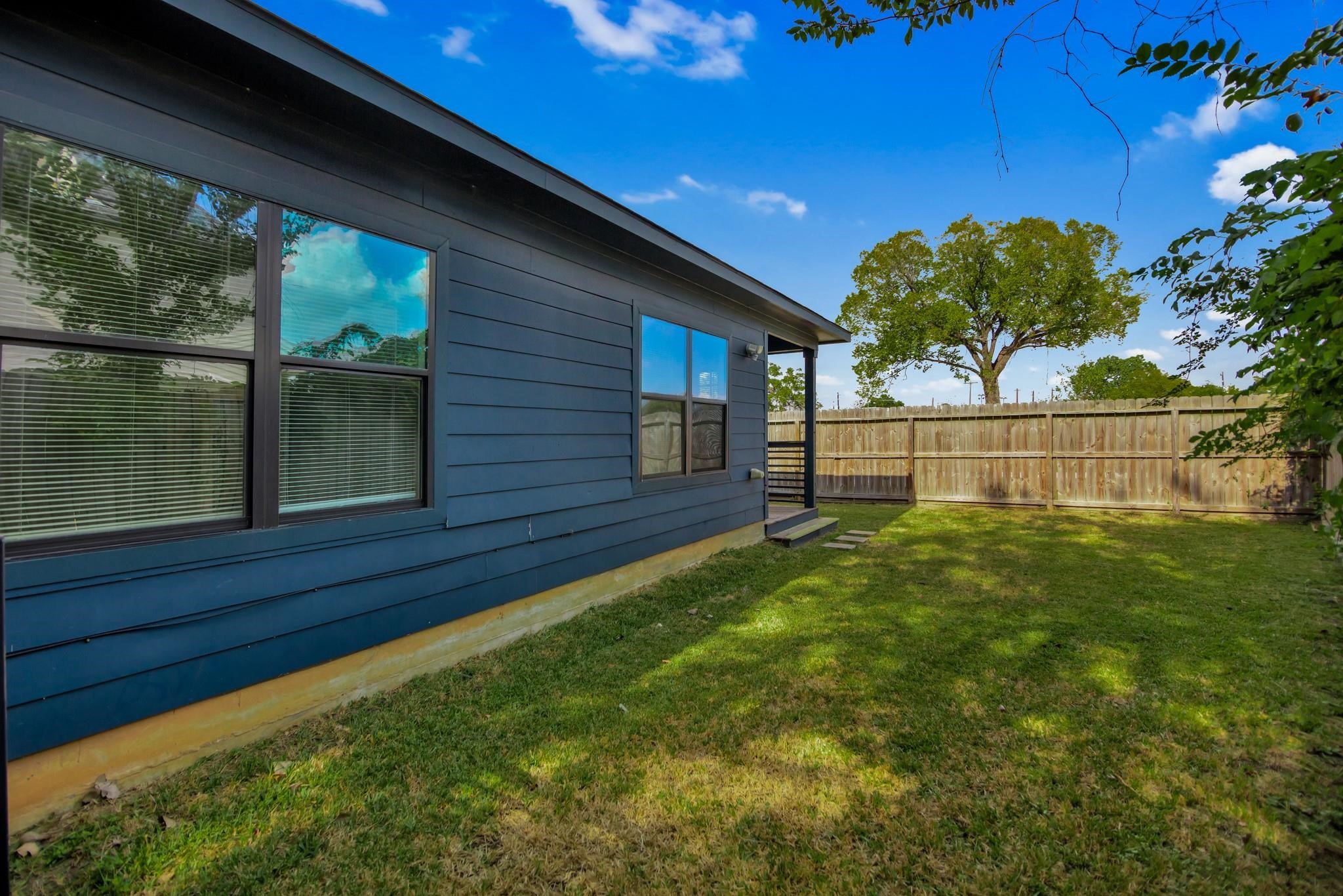603 Edgewood Street, Unit B Houston, TX 77023 - Photo 13 of 16 a view of backyard with garden and deck