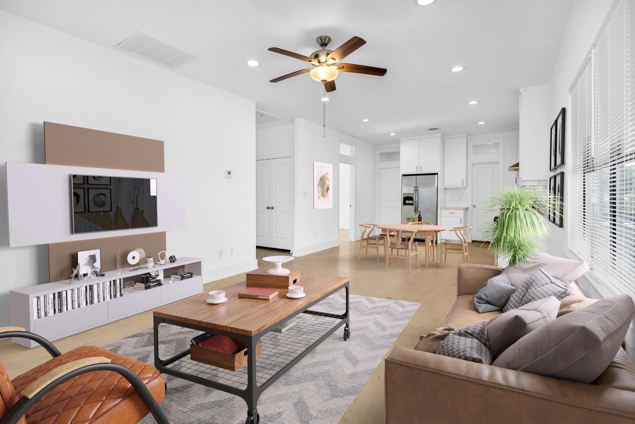 603 Edgewood Street, Unit B Houston, TX 77023 - Photo 2 of 16 a living room with furniture and kitchen view