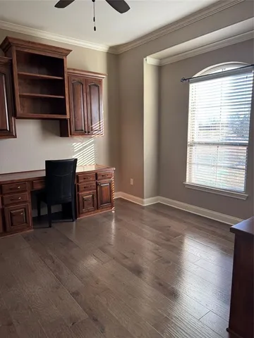 a living room with furniture fireplace and flat screen tv