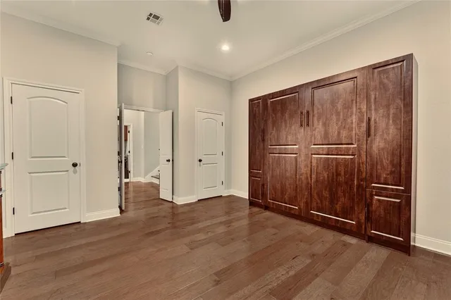 a bathroom with a double vanity sink toilet mirror and shower