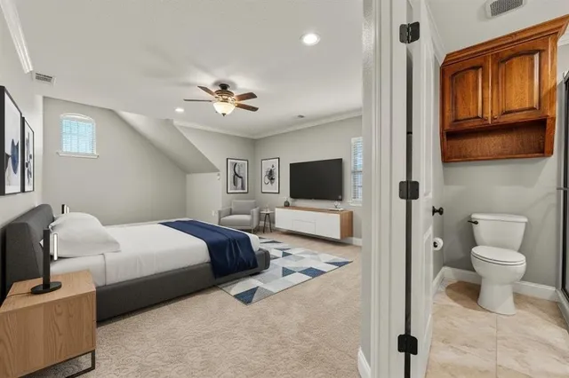 a bathroom with a granite countertop sink toilet and mirror